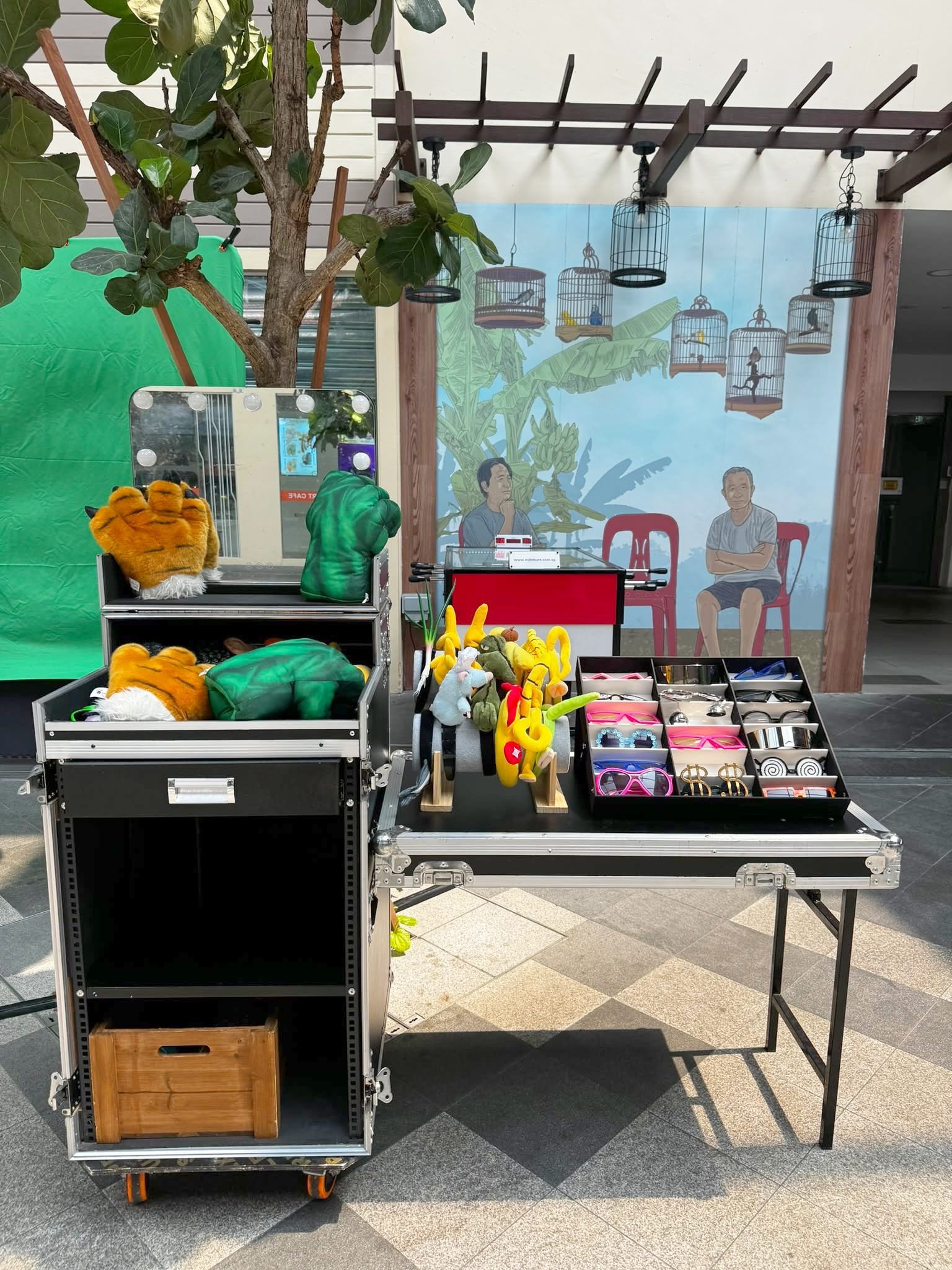 Corporate Photobooth: organised prop cases beside the photo area
